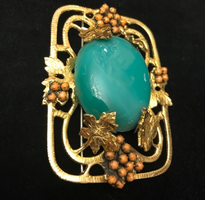 green and coral brooch